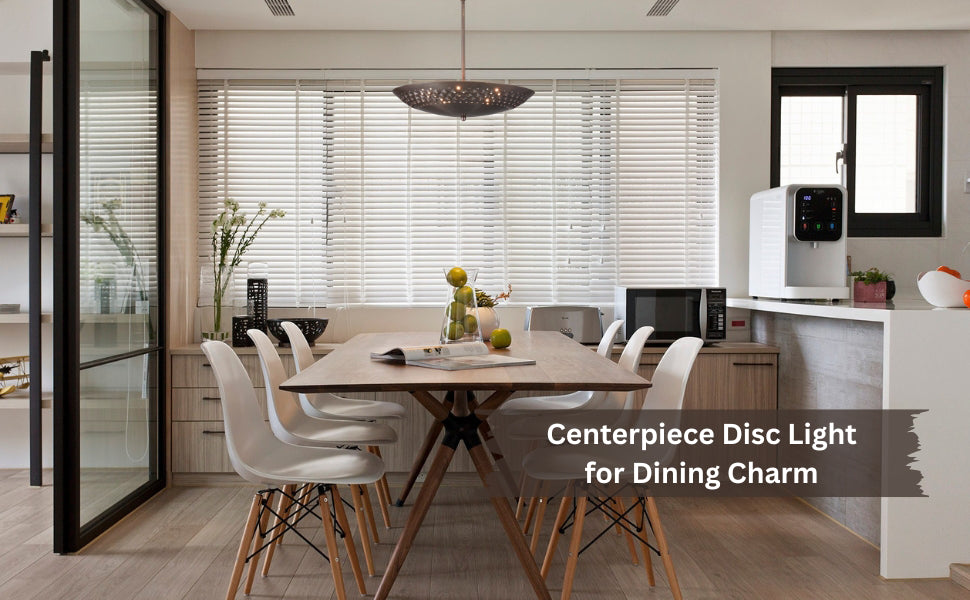 Dining room with minimalist brass disc chandelier above wooden table and modern chairs