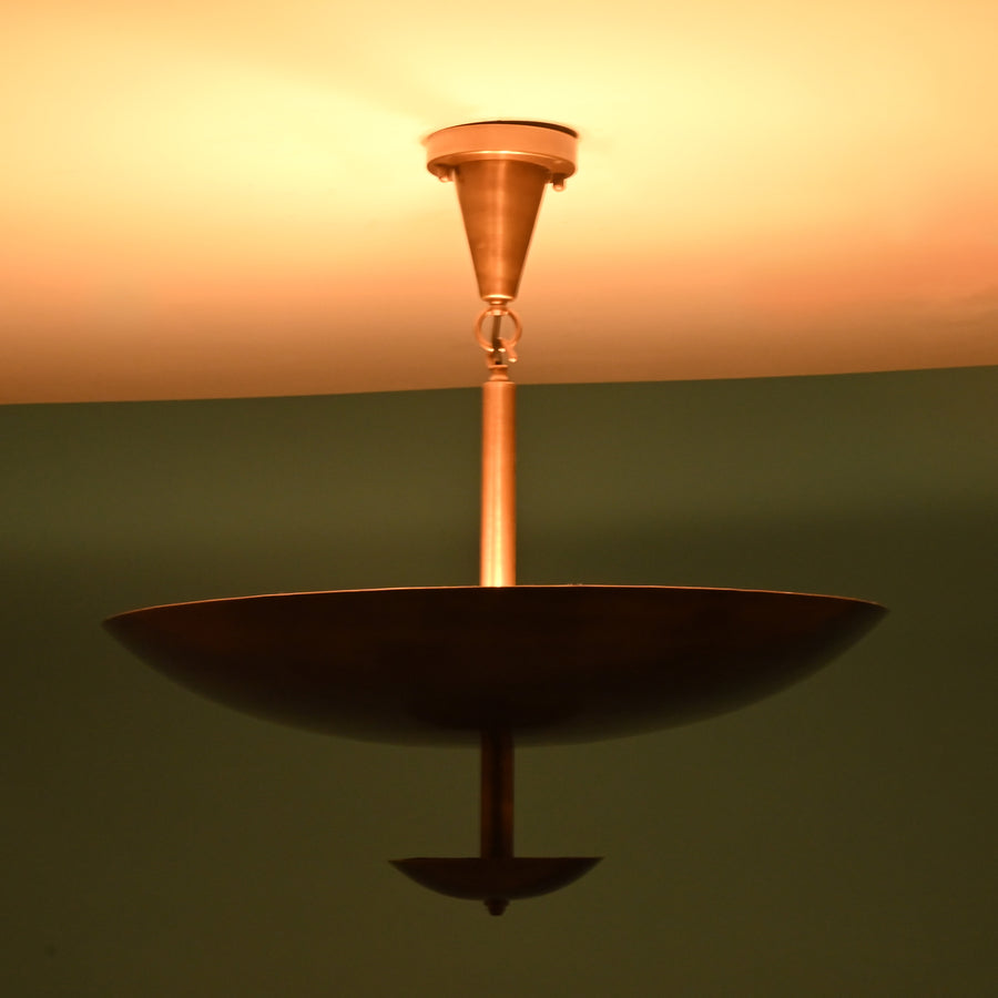 Handcrafted brushed brass bowl disc chandelier in solid brass with sculptural layered design and clean modern ceiling profile