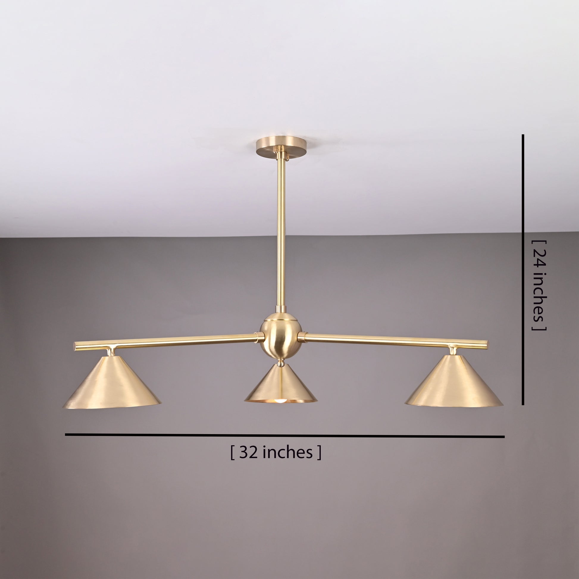 Brushed brass chandelier with cone shades displaying dimensions of 32 inches wide and 24 inches high, ideal for modern interiors and design planning