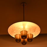 Handmade brass disc chandelier casting indirect ambient light, four bowl design ideal for dining rooms and living spaces