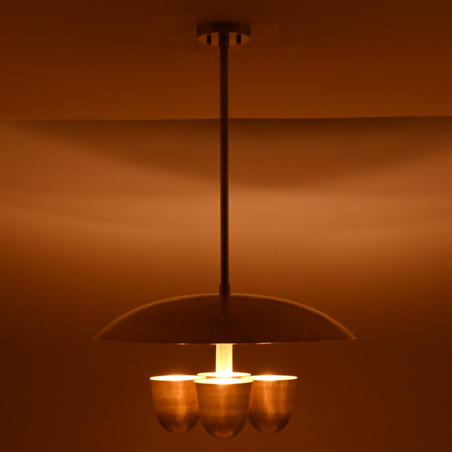 Handcrafted brushed brass disc chandelier with four bowl shaped shades, modern industrial ceiling light with minimalist design