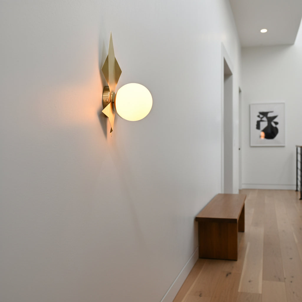 Brussels wall sconce dimension view showing 16 inch height and 14 inch width with glass globe and brass leaf design