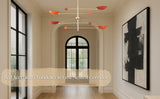 Red-accented chandelier featured in a luxury neutral-toned corridor interior