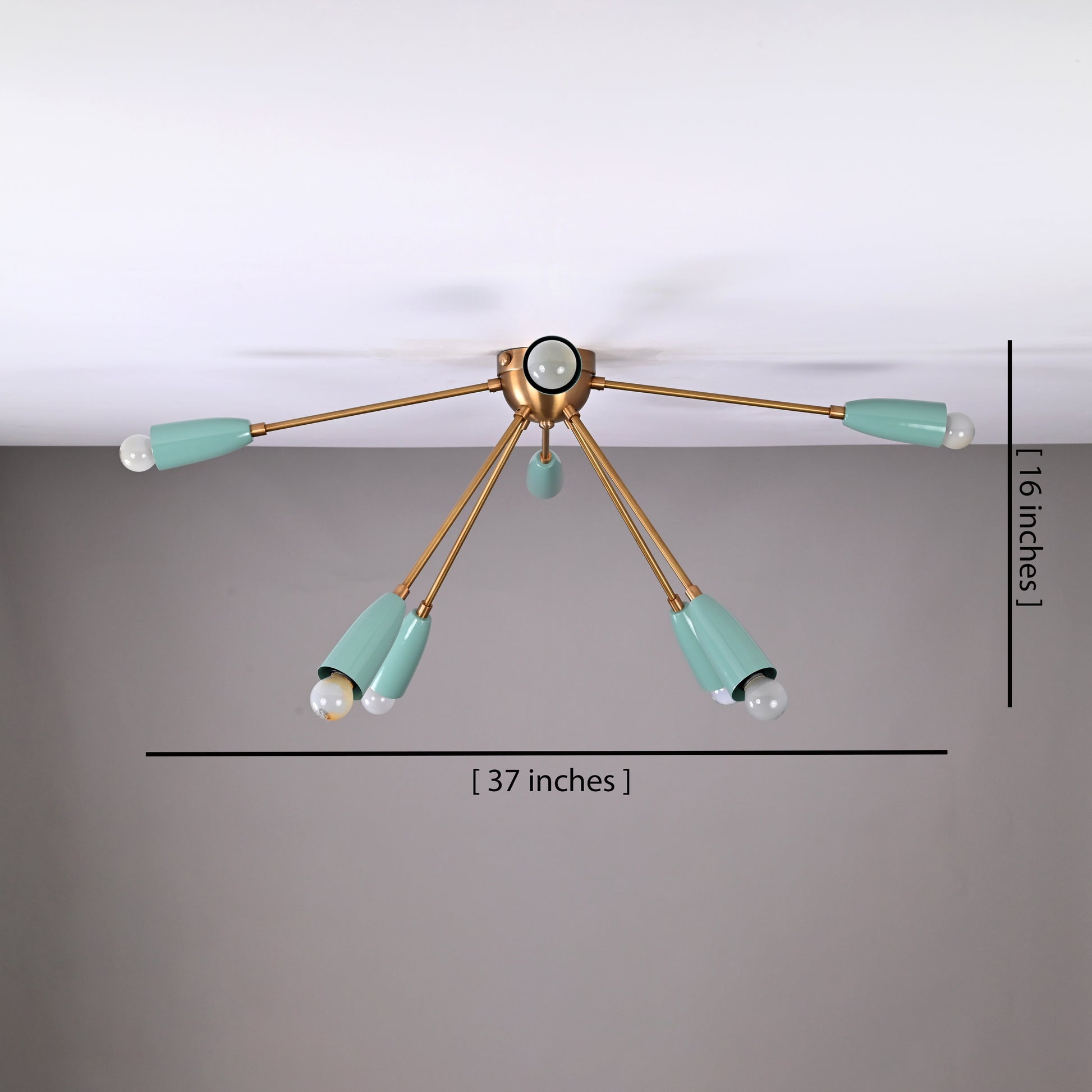 8-light mint green and brass chandelier radiating warm ambient light, ideal for modern living and dining areas with a cozy atmosphere