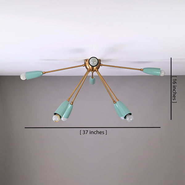 8-light mint green and brass chandelier radiating warm ambient light, ideal for modern living and dining areas with a cozy atmosphere