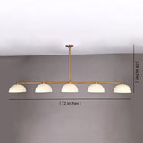Front view of 72-inch wide, 28-inch tall linear brass chandelier with dome shades shown against a gray wall