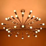 Warm ambient lighting view of 36-light chrome Sputnik chandelier enhancing modern living space decor