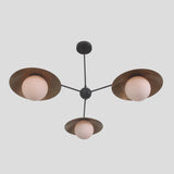 Contemporary 3-light brass chandelier viewed from below, featuring globe-shaped lights with wide brass dome shades.