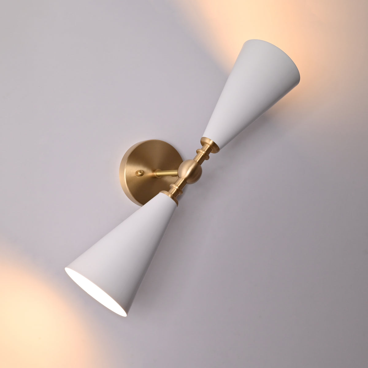 Copenhagen wall sconce side view showing straight brass arm, round canopy, and vertical cone shade design