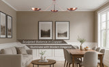 Copper 3-light flushmount chandelier with bowl shades hanging in a modern dining and living area.