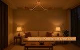 Copper 3-light flushmount chandelier with bowl shades softly illuminating a cozy living room at night.