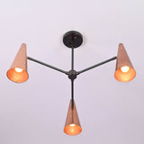 Angled view of copper cone chandelier emitting warm ambient light from three cone shades