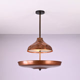 Modern copper disc chandelier with warm indirect lighting and sculptural bowl shade, handcrafted from solid brass