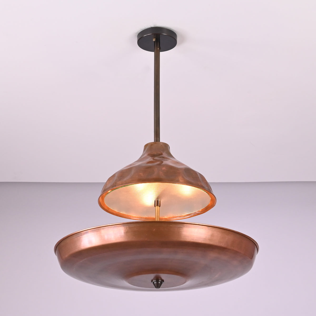 Modern industrial copper ceiling chandelier with layered disc design and premium brass construction