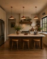 Copper pendant light installed in a hallway with warm ambient glow and slim black hanging cord
