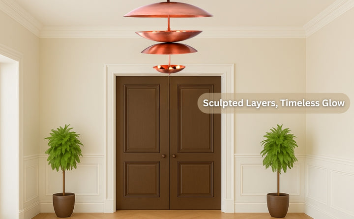 Modern chandelier with layered copper discs in warm patina finish, designed for ambient luxury
