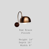 Brass dome wall sconce with curved arm showing raw brass finish and size dimensions