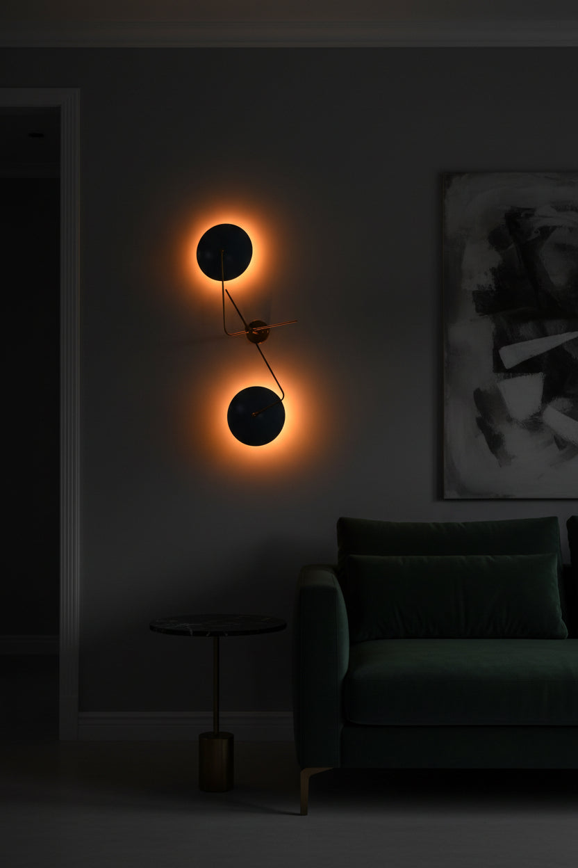 Custom blue disc wall light fixture with solid brass arms, round canopy, and sculptural modern statement design