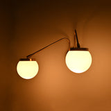 Custom double globe wall fixture suitable for bathroom vanities, hallways, living rooms, hotels, and cafés