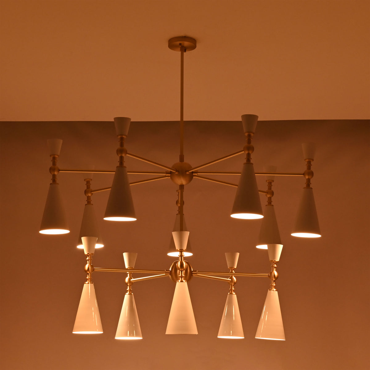 Customizable brass cone chandelier with white enamel shades, suitable for luxury homes, villas, hotels, and designer interiors