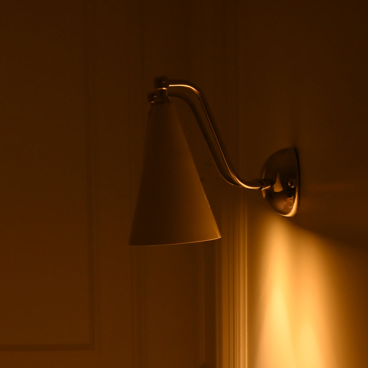 Fully brass wall light with chrome finish, curved arms and two ivory enamel cone shades