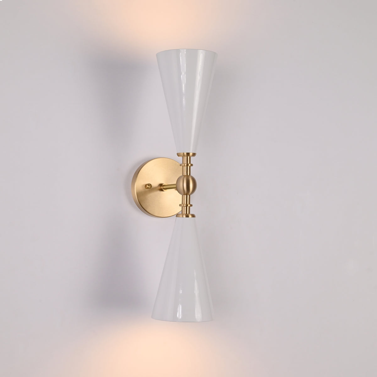 Designer white cone and brushed brass wall fixture with elegant mid century architectural style