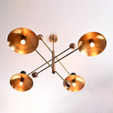 Top view of Diabolo 8-light brass chandelier featuring wide bowl shades and black conical tops in a modern mid-century design.