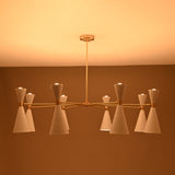 Brass Diabolo chandelier with 16 cone shades glowing in warm light, mid-century modern brass ceiling fixture.