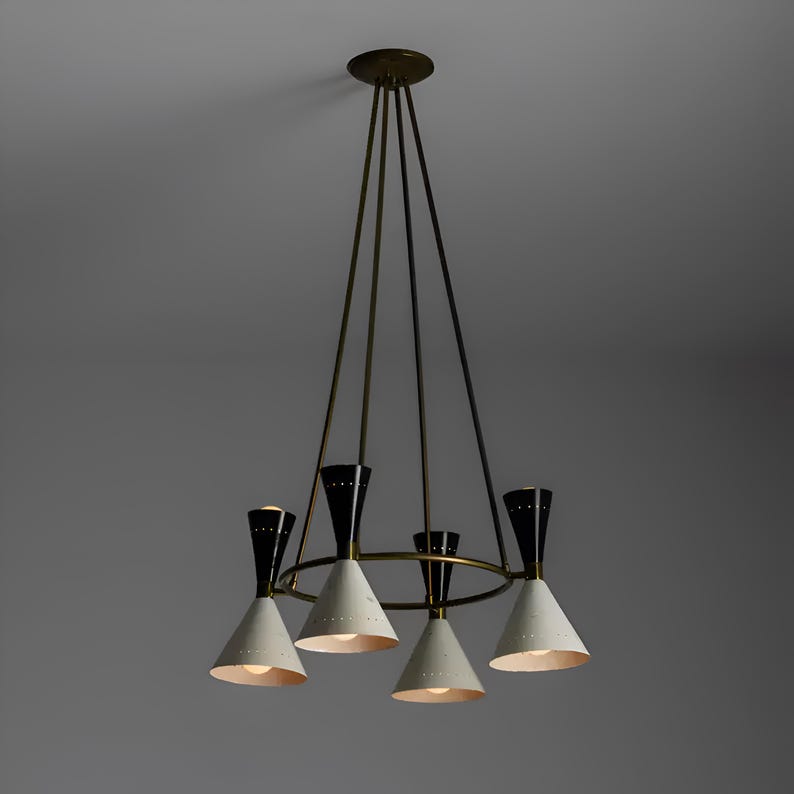 Diabolo style brass chandelier with cone-shaped shades and minimalist circular frame creating warm ambient lighting
