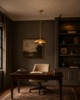 Discus on chain brass dome pendant light with wide shallow shade and warm downward glow for dining rooms and kitchens