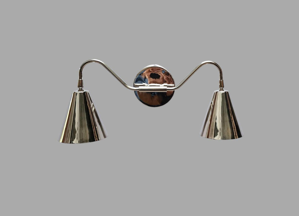 Rear view of brass double cone wall sconce with polished metallic finish