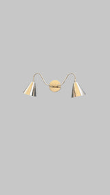 Symmetrical design of brass double cone wall sconce with two polished cone shades