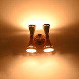 Dual diabolo wall sconce dimension view showing 10 inch height and 10 inch width