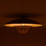 Elegant raw brass flush mount light with luminous halo effect, radiating subtle golden illumination for modern interiors