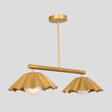Elegant double-light brass chandelier with decorative ruffle shades, blending modern art with ambient lighting.