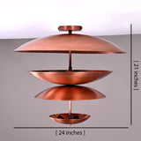 Dimensional view of a 24-inch wide and 21-inch tall brass flushmount chandelier with layered bowl-shaped shades in a brushed copper finish.