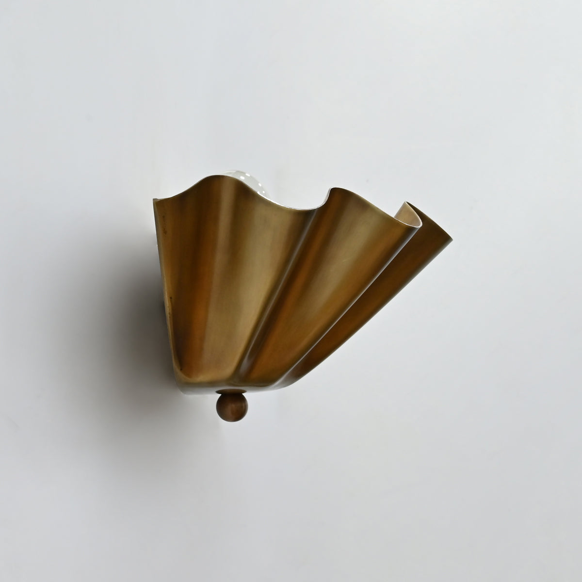 12 inch wide fluted brass wall sconce with scalloped shade design for hallway, bedroom, or entryway lighting