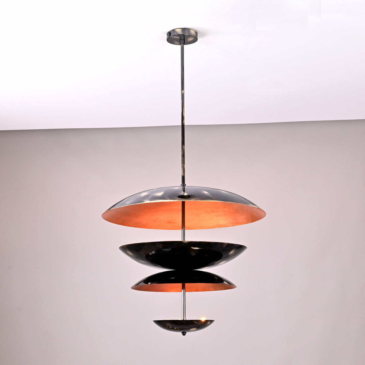 Fountain Disc Chandelier in natural black brass and copper patina finish, modern pendant light
