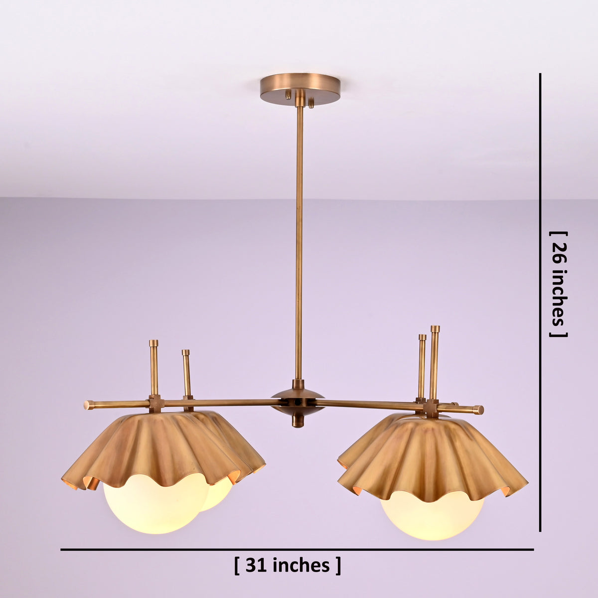 Four-light brass chandelier showing 31-inch width and 26-inch height with sculpted bowl shades.