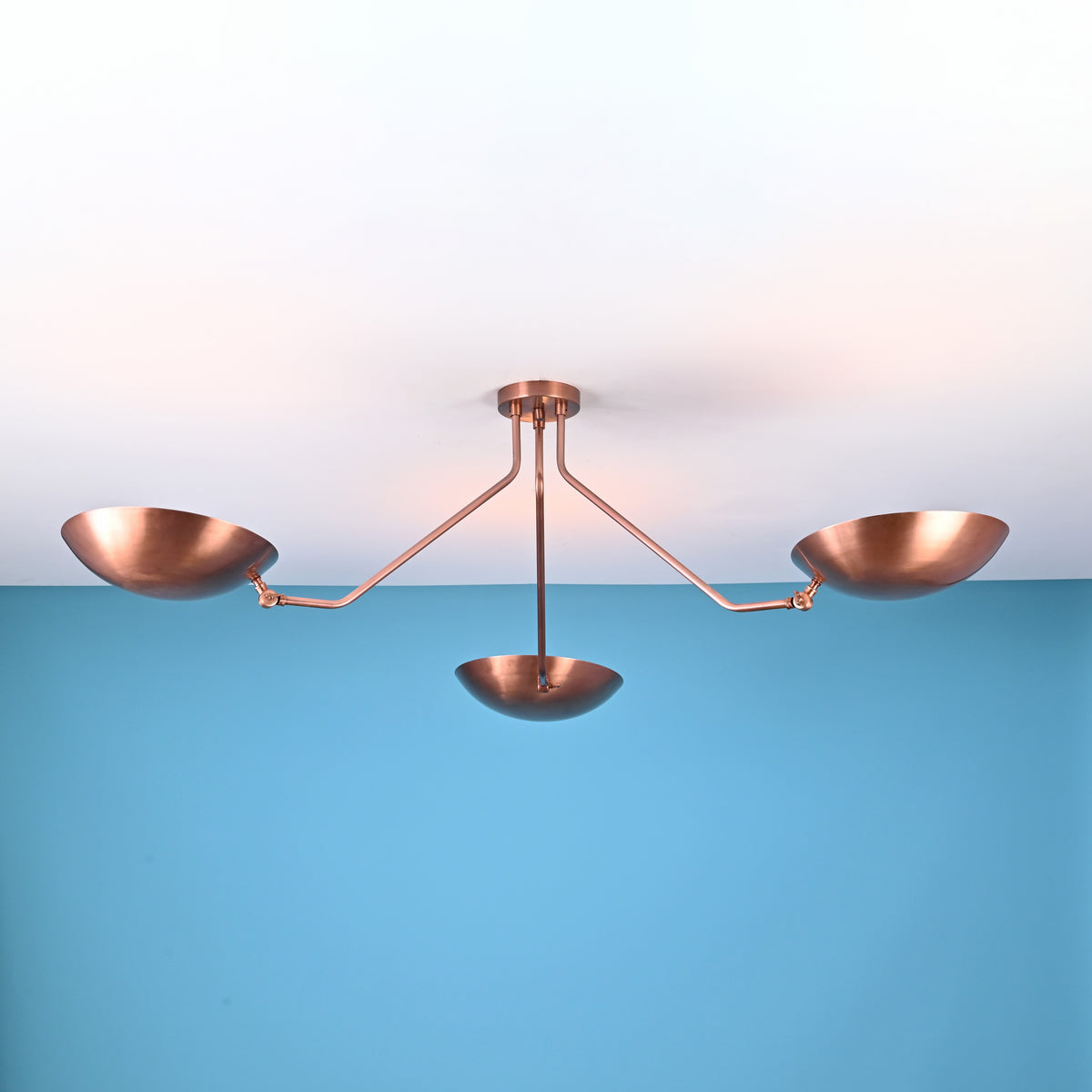 Handcrafted solid brass 3 light flush mount ceiling fixture with sculpted bowl shades and balanced linear form