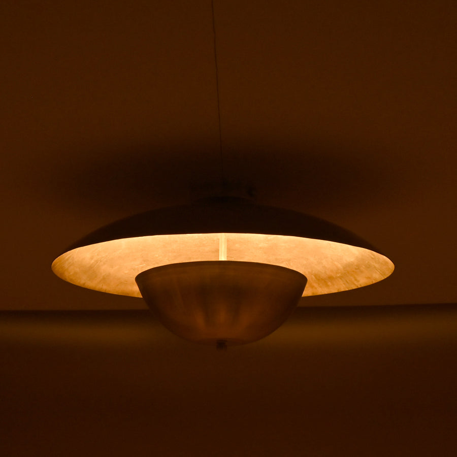 Handmade brass disc flush mount light featuring dual bowl structure with polished brass finish for modern interiors