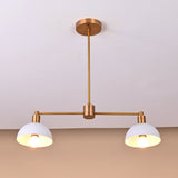 Handcrafted brass pendant with dual dome shades showing balanced horizontal structure