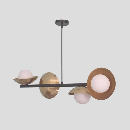 Handmade brass chandelier with three globe lights and brushed brass bowl shades in a minimalist linear pendant design.