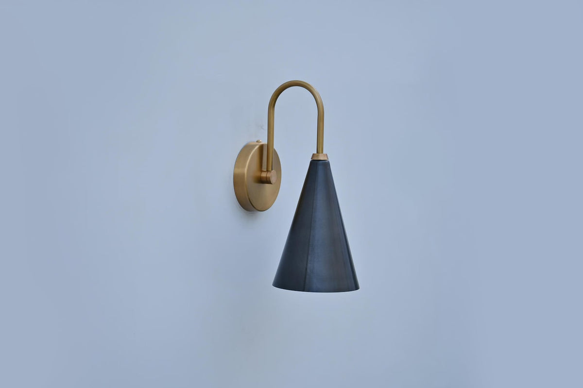 Handmade solid brass wall light with matte black cone shade, elegant minimalist design by Brass Leaf Studio