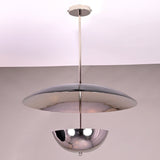 Handmade chrome brass lighting fixture featuring a smooth disc and reflective lower bowl
