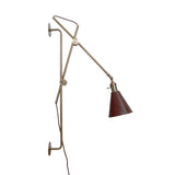 Handmade solid brass wall lamp with long adjustable arm and conical shade
