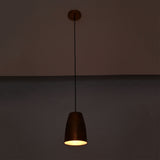 Hudson Hammered Copper Bell Pendant Light displaying warm ambient illumination with handcrafted hammered copper finish.