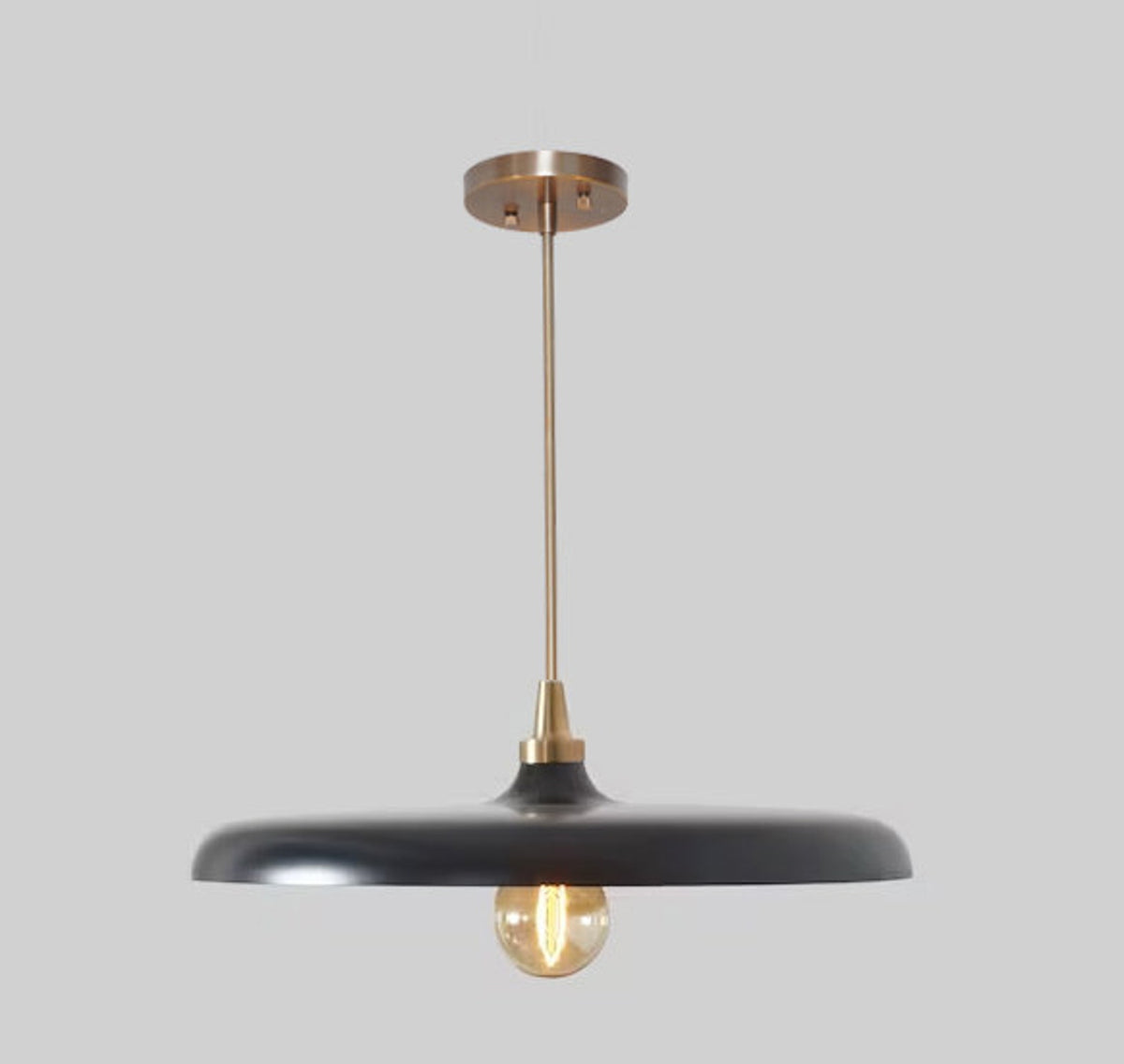 Black and brass dome pendant ceiling light with Edison bulb and decorative brass chain