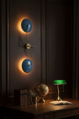 Large blue disc wall sconce dimension view showing 45.5 inch height and 18 inch width for product size reference