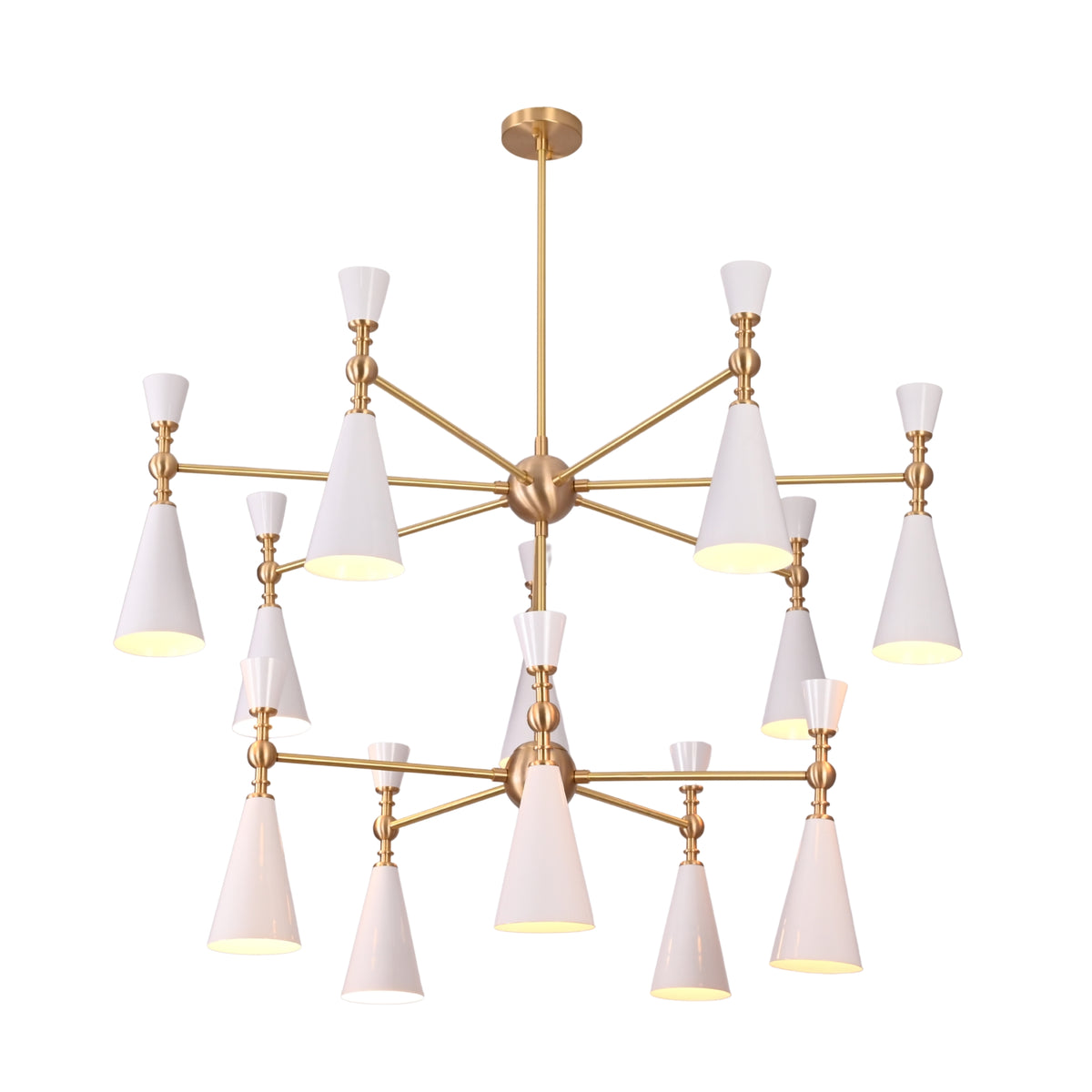 Large brushed brass cone chandelier detail showing decorative sphere accents, straight arms, and white painted cone shades